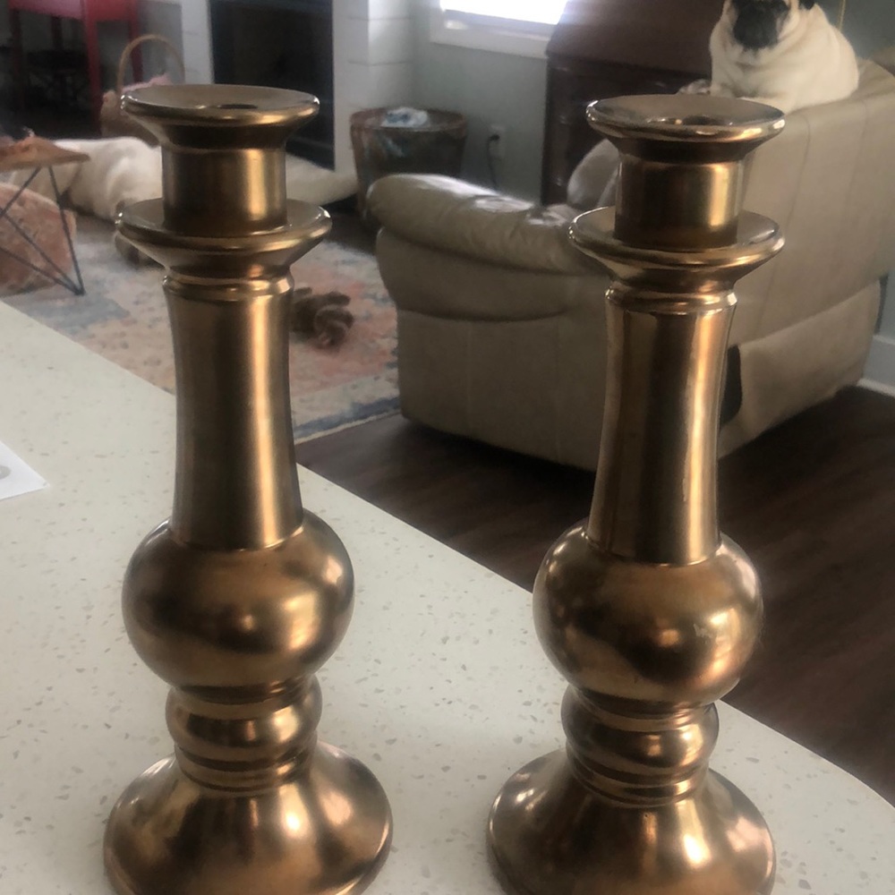Set of two elements shiny bronze candle holders